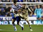 Leeds' Luke Varney and Reading's Stephen Kelly battle for the ball during their Championship match on September 18, 2013