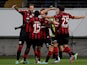 Frankfurt's Marco Russ is congratulated by team mates after scoring his team's second goal against Bordeaux during their Europa League group match on September 19, 2013