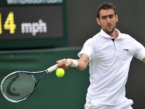 Cilic returns with a win in Paris