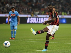 Milan striker Mario Balotelli misses a penalty against Napoli on September 22, 2013
