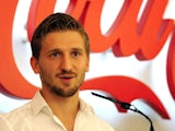Sevilla's new player German Marko Marin talks to the press during his official presentation in Sevilla, on July 4, 2013