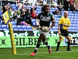London Irish's Marland Yarde scores a try against Exeter Chiefs during their Aviva Premiership match on September 21, 2013