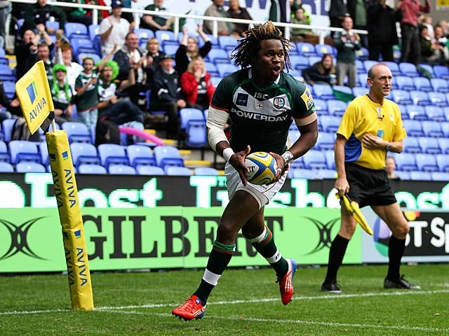London Irish's Marland Yarde scores a try against Exeter Chiefs during their Aviva Premiership match on September 21, 2013