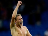 Spurs defender Michael Dawson celebrates the late win over Cardiff on September 22, 2013
