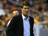 Swansea boss Michael Laudrup on the touchline during his team's Europa League group match against Valencia on September 19, 2013