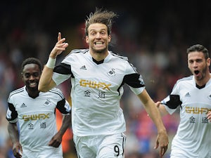 Michu delighted with Spain debut