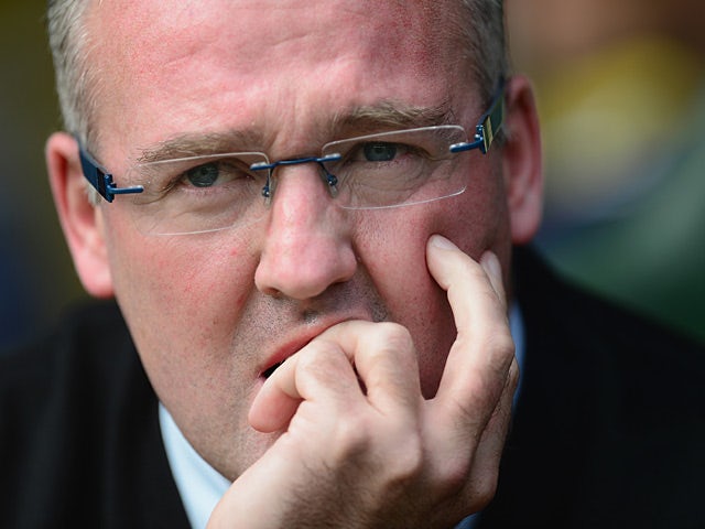 Aston Villa manager Paul Lambert watches his team during their Premier League match against Norwich on September 21, 2013