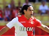 Monaco's Colombian forward Radamel Falcao celebrates after scoring a goal from the penalty spot during the French L1 football match between AS Monaco and FC Lorient at the Louis II Stadium in Monaco on September 15, 2013