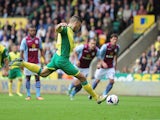 Norwich's Robert Snodgrass takes a penalty against Aston Villa during their Premier League match on September 21, 2013