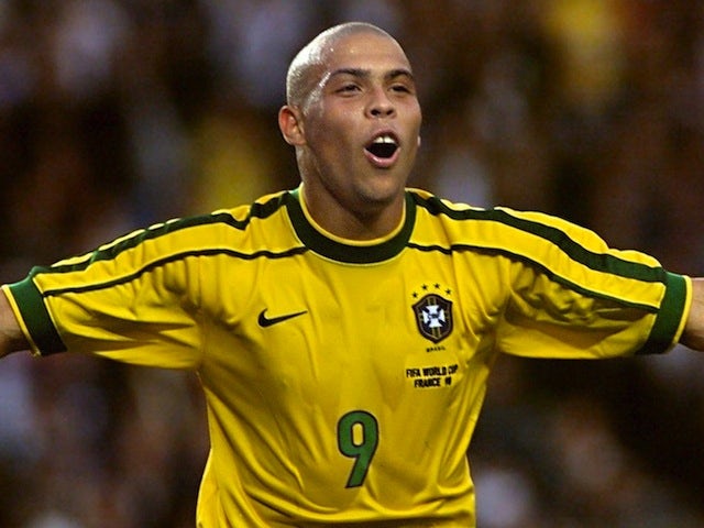 Brazil striker Ronaldo celebrates after scoring his second goal during the 1998 World Cup second round match between Brazil and Chile on June 27, 1998