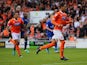 Blackpool's Tom Ince celebrates after scoring the equaliser from the penalty spot against Leicester during their Championship match on September 21, 2013