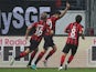 Frankfurt's Vaclav Kadlec is congratulated by team mates after scoring his team's opening goal against Bordeaux during their Europa League group match on September 19, 2013