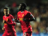 Liverpool's Victor Moses celebrates after scoring his team's second goal against Swansea on September 16, 2013