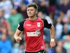 Aaron Cresswell of Ipswich in action during the Sky Bet Championship match between Queens Park Rangers and Ipswich Town at Loftus Road on August 17, 2013
