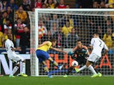 Aaron Ramsey scores Arsenal's second against Swansea on September 28, 2013