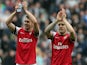 Welsh midfielder Aaron Ramsey and English midfielder Jack Wilshere acknowledge the crowd as they celebrate their victory after the final whistle in the English Premier League football match between Newcastle United and Arsenal at St James' Park in Newcast