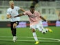 Abel Hernandez of US Citta di Palermo in action against Hordur Bjorvin Magnusson of AC Spezia during the Serie B match between AC Spezia and US Citta di Palermo at Stadio Alberto Picco on September 20, 2013