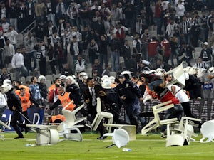 Besiktas penalised for pitch invasion