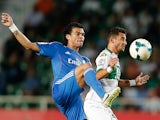 Real's Pepe and Elche's Coro battle for the ball during their La Liga match on September 25, 2013