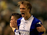 Birmingham's Dan Burn celebrates after scoring the opening goal against Swansea during their League Cup match on September 25, 2013