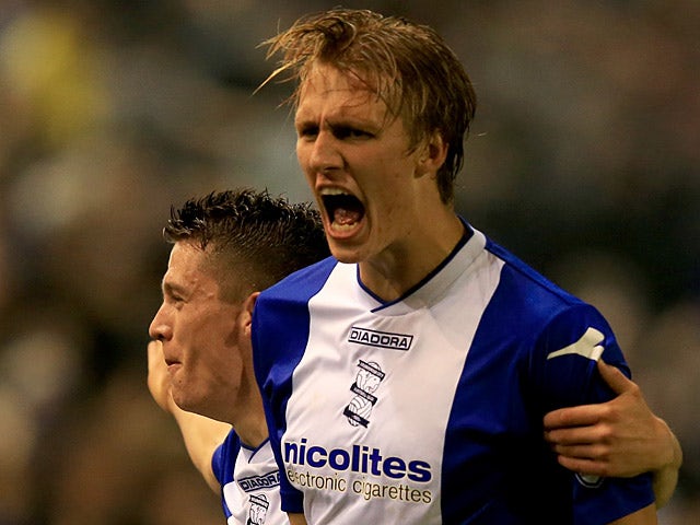 Birmingham's Dan Burn celebrates after scoring the opening goal against Swansea during their League Cup match on September 25, 2013