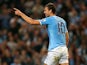 Man City's Edin Dzeko celebrates after scoring the opening goal against Wigan during their League Cup match on September 24, 2013