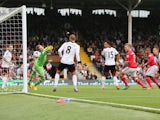 Goalkeeper David Stockdale of Fulham fails to stop a header by Steven Caulker of Cardiff City during the Barclays Premier League match between Fulham and Cardiff City at Craven Cottage on September 28, 2013