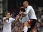 Bryan Ruiz of Fulham is congratulated by Sascha Riether and Pajtim Kasami after scoring their first goal during the Barclays Premier League match between Fulham and Cardiff City at Craven Cottage on September 28, 2013