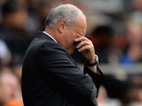 Manager Martin Jol of Fulham looks dejected during the Barclays Premier League match between Fulham and Cardiff City at Craven Cottage on September 28, 2013