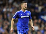 Chelsea's English defender Gary Cahill runs with the ball during the English Premier League football match between Chelsea and Fulham at Stamford Bridge in London on September 21, 2013