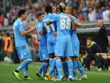 Goran Pandev of Napoli celebrates with his team-mates after scoring the opening goal during the Serie A match between Genoa CFC and SSC Napoli at Stadio Luigi Ferraris on September 28, 2013