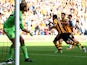 Robbie Brady of Hull City is congratulated by teammate Danny Graham #9 after scoring the opening goal from the penalty spot during the Barclays Premier League match between Hull City and West Ham United at KC Stadium on September 28, 2013