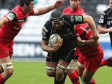 Ian Gough of the Ospreys charges upfield during the Heineken Cup match between Ospreys and Stade Toulouse at the Liberty Stadium on December 15, 2012