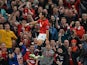 Man United's Javier Hernandez celebrates in front of fans after scoring the opening goal against Liverpool during their League Cup match on September 25, 2013