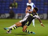 Stoke's Jermaine Pennant and Tranmere's Chris Atkinson battle for the ball during their League Cup match on September 25, 2013