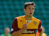 John Sutton of Motherwell in action during the Scottish Premiership League match between Hibernian and Motherwell at Easter Road on August 04, 2013