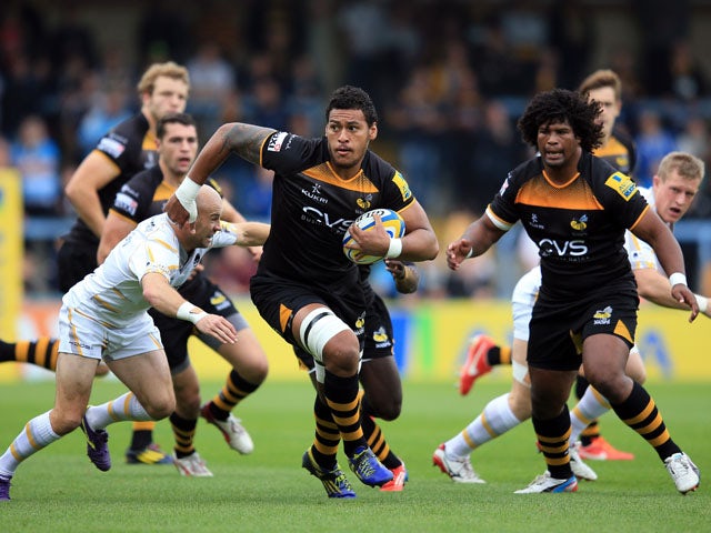 Nathan Hughes of Wasps makes a break during the Aviva Premiership match between London Wasps and Worcester Warriors at Adams Park on September 28, 2013