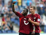 Mame Biram Diouf of Hannover celebrates scoring his team's first goal with Artur Sobiech of Hannover the Bundesliga match between Hannover 96 and 1. FSV Mainz 05 at HDI Arena on August 31, 2013