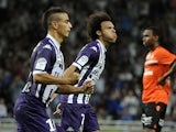 Toulouse's Martin Braithwaite celebrates after scoring the opening goal against Lorient during their Ligue 1 match on September 25, 2013