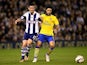 West Brom's Graham Dorrans and Arsenal's Mikel Arteta battle for the ball during their League Cup match on September 25, 2013