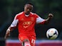 Nathaniel Clyne of Southampton kicks the ball during a friendly match between Southampton FC and UE Llagostera at the Josep Pla i Arbones Stadium on July 17, 2013