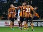 Hull's Nick Proschwitz celebrates with teammate Abdoulaye Diagne-Faye after scoring the opening goal against Huddersfield during their League Cup match on September 24, 2013