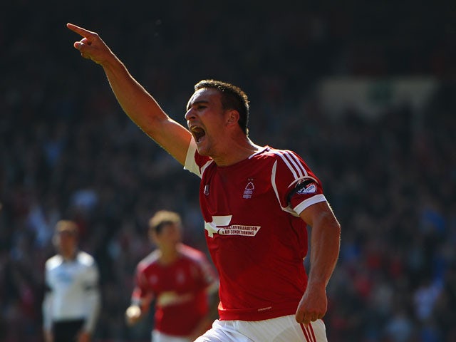 Jack Hobbs of Nottingham Forest celebrates scoring the opening goal during the Sky Bet Championship match between Nottingham Forest and Derby County at City Ground on September 28, 2013