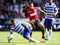 Paul Taylor of Ipswich battles with Chris Gunter of Reading during the Sky Bet Championship match between Reading and Ipswich Town at the Madejski Stadium on August 03, 2013
