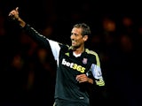 Stoke's Peter Crouch celebrates after scoring his team's second goal against Tranmere during their League Cup match on September 25, 2013
