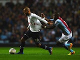 Tottenham's Sandro and Villa's Yacouba Sylla battle for the ball during their League Cup match on September 24, 2013