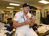 Tim Bresnan of England poses with the urn in the dressing room after winning the Ashes during day five of the 5th Investec Ashes Test match between England and Australia at the Kia Oval on August 25, 2013