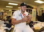 Tim Bresnan of England poses with the urn in the dressing room after winning the Ashes during day five of the 5th Investec Ashes Test match between England and Australia at the Kia Oval on August 25, 2013