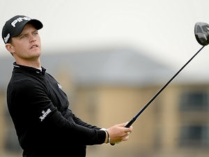 Lewis tops Dunhill leaderboard