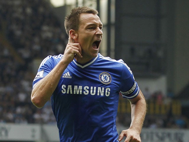 Chelsea's English defender John Terry celebrates after scoring a goal during the English Premier League football match between Tottenham Hotspur and Chelsea at White Hart Lane in London on September 28, 2013